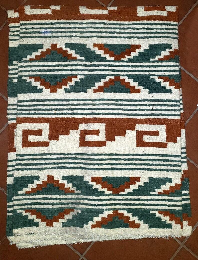 Handwoven Guatemalan wool rug poncho made in Momostenango