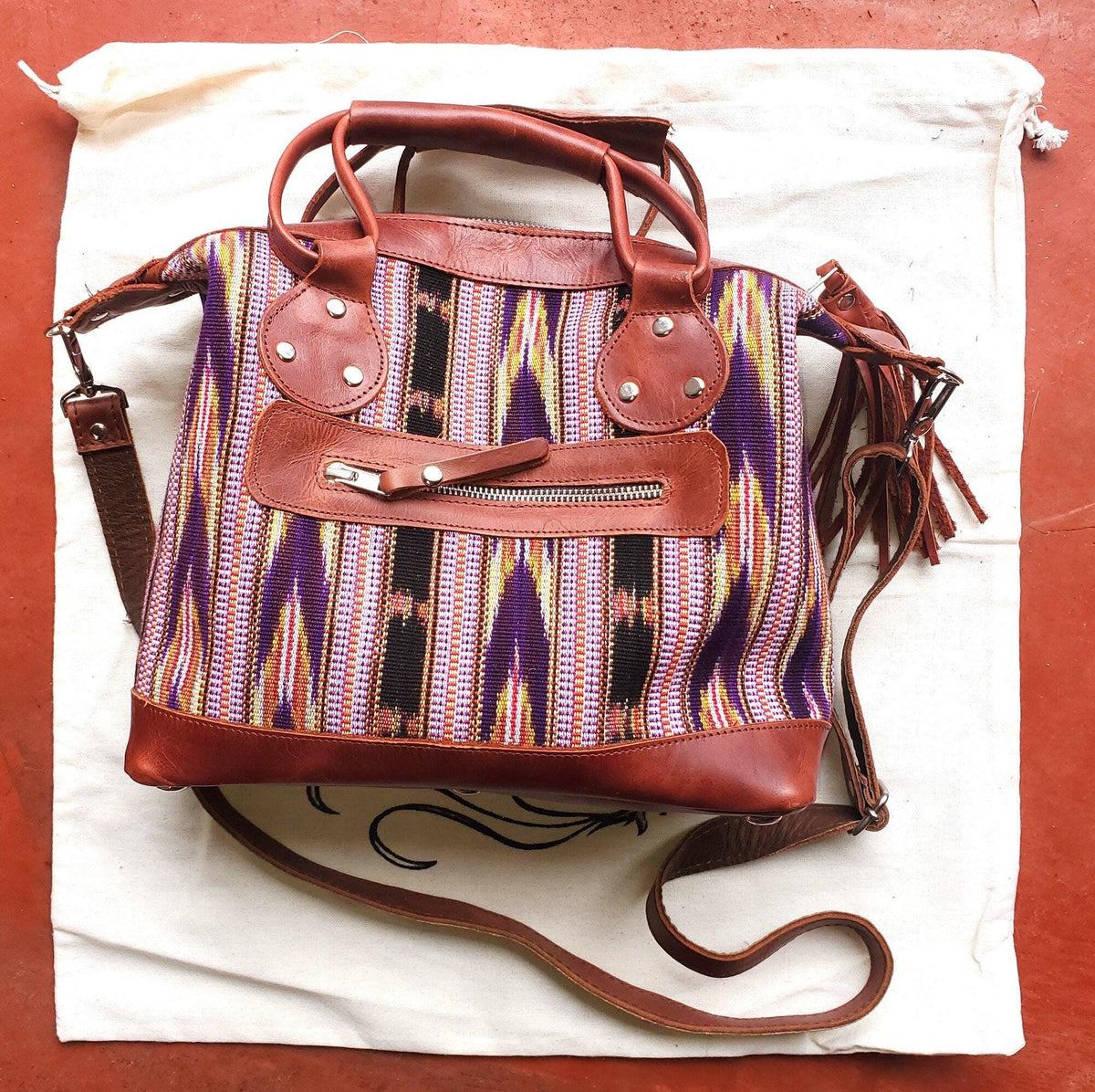 Crossbody shoulder day bag genuine Tan leather color combined with a vibrant Guatemalan pattern