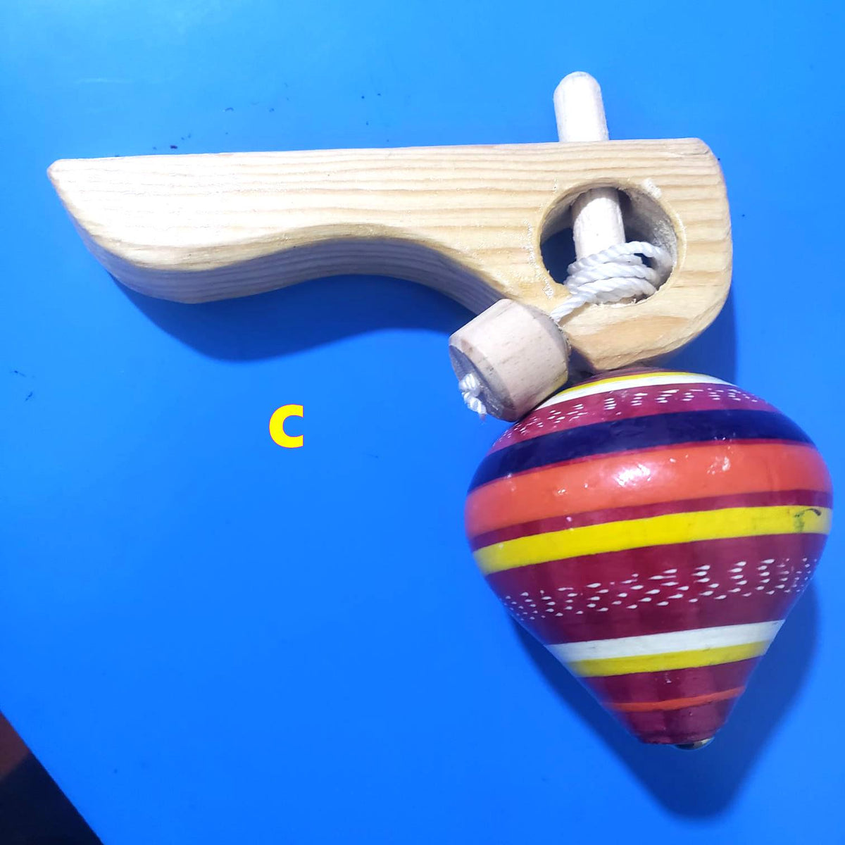 Guatemalan Spinning Wooden Top Toy: Handcrafted Kids' Gift