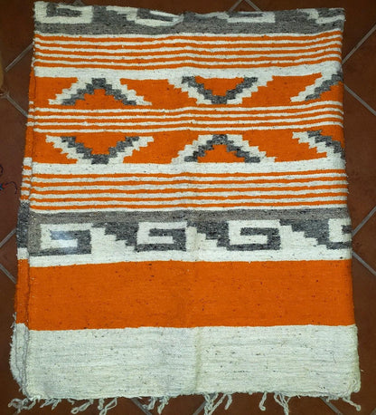 Handwoven Guatemalan wool rug poncho made in Momostenango