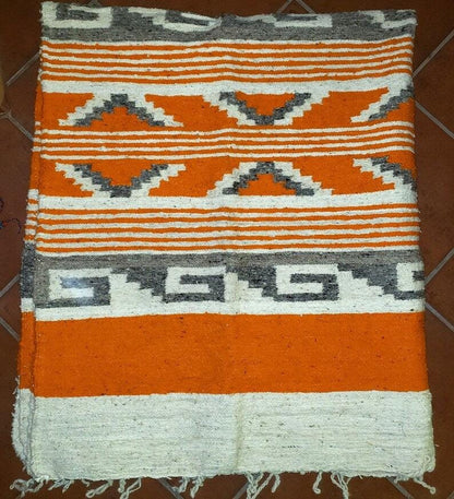Handwoven Guatemalan wool rug poncho made in Momostenango