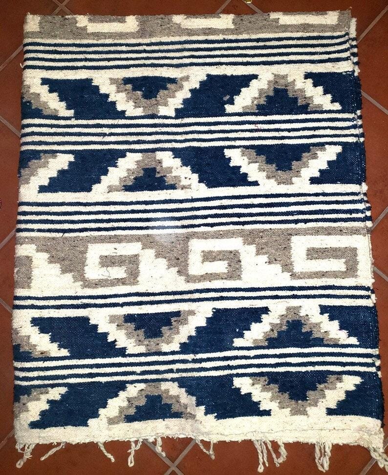 Handwoven Guatemalan wool rug poncho made in Momostenango