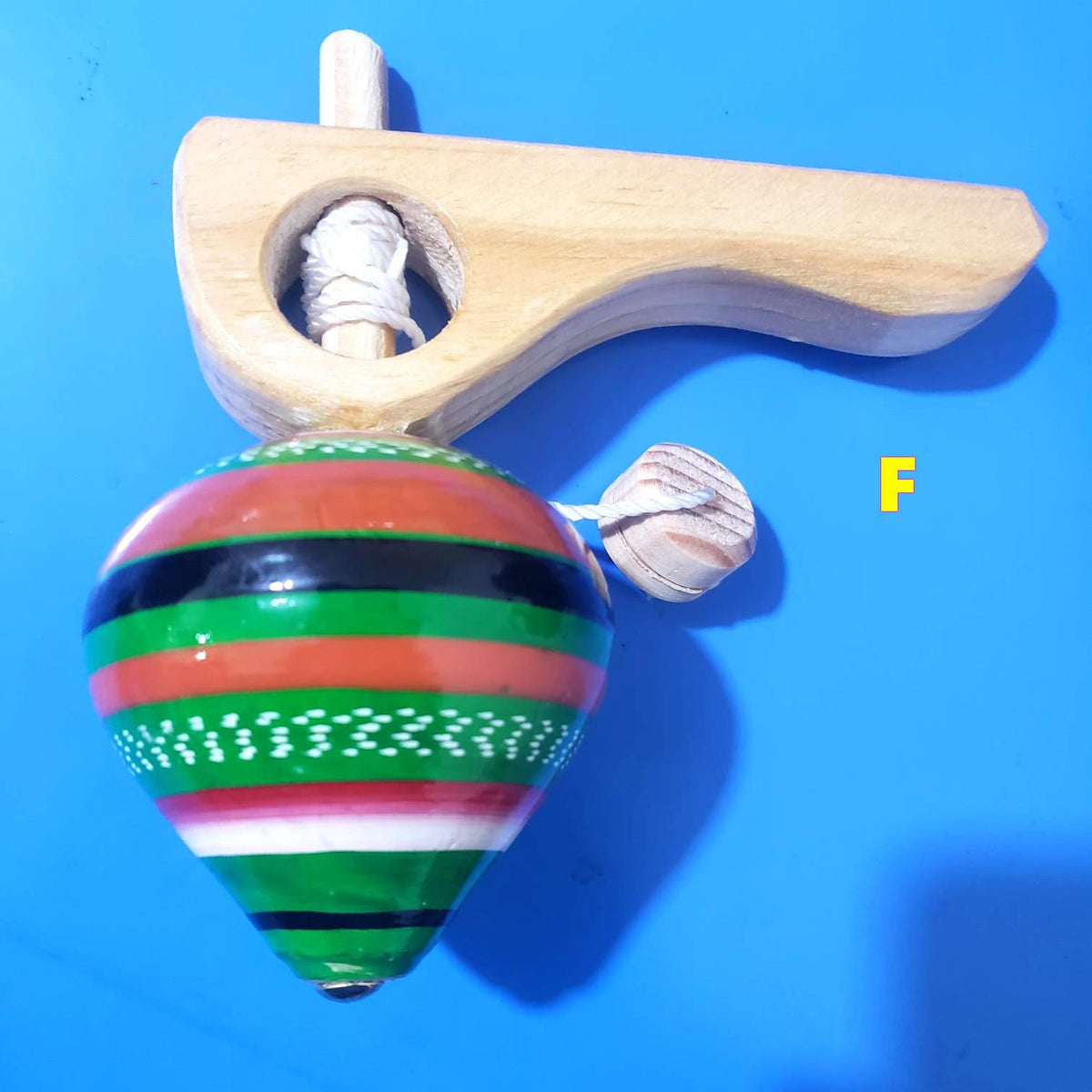 Guatemalan Spinning Wooden Top Toy: Handcrafted Kids' Gift