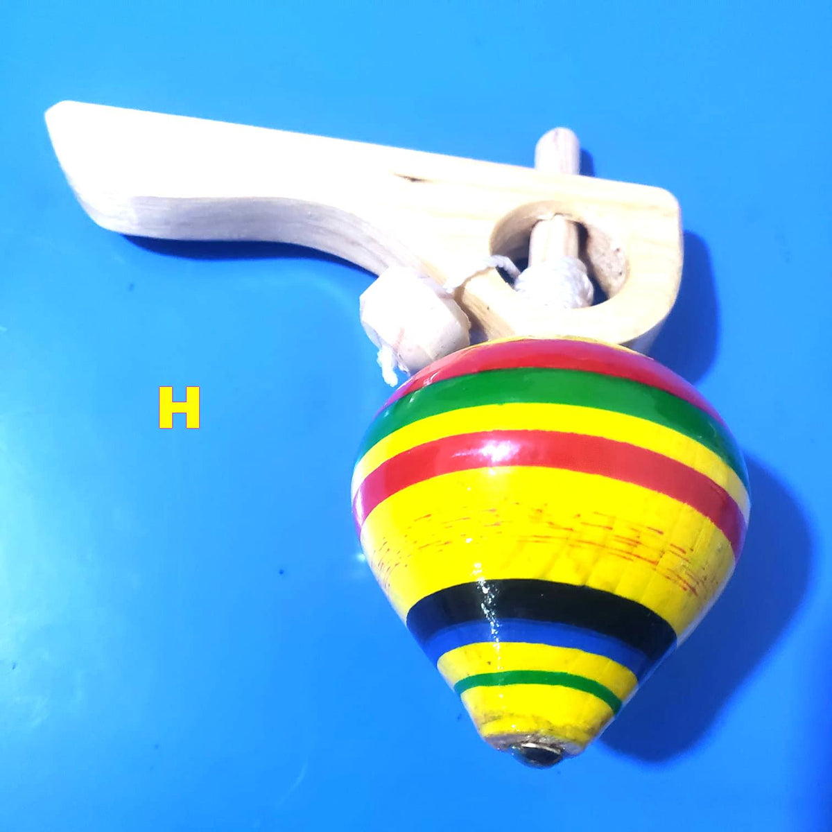 Guatemalan Spinning Wooden Top Toy: Handcrafted Kids' Gift